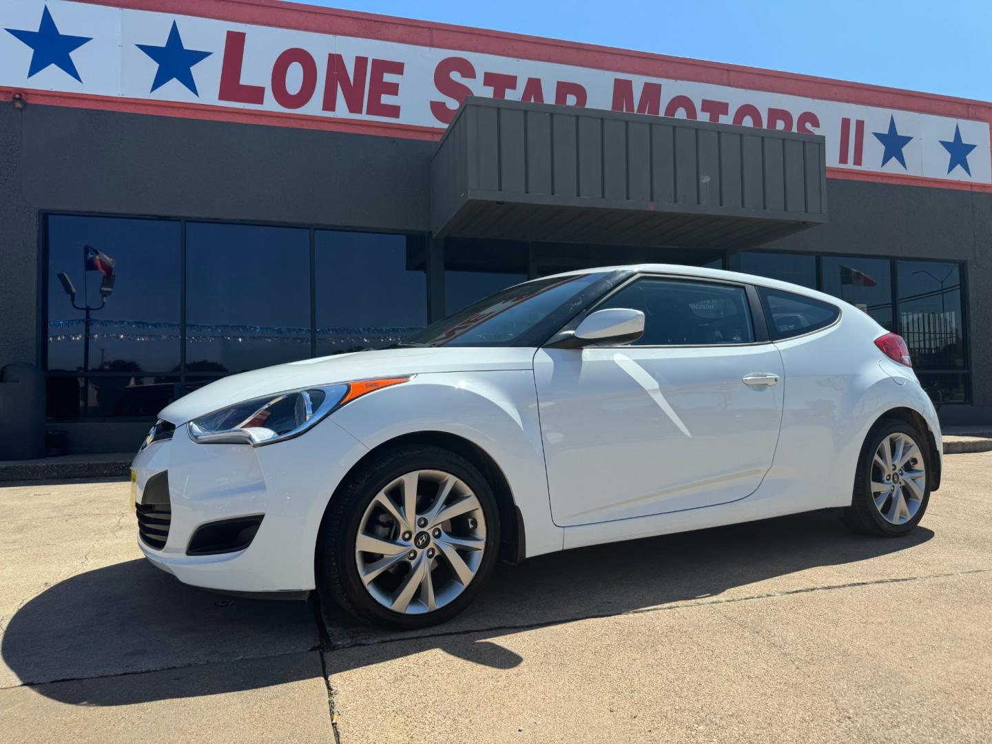 2016 WHITE /Gray HYUNDAI VELOSTER Base 3dr Coupe (KMHTC6AD7GU) with an 1.6L I4 engine, Automatic 6-Speed transmission, located at 5900 E. Lancaster Ave., Fort Worth, TX, 76112, (817) 457-5456, 0.000000, 0.000000 - This is a 2016 Hyundai Veloster Base 3dr Coupe that is in excellent condition. There are no dents or scratches. The interior is clean with no rips or tears or stains. All power windows, door locks and seats. Ice cold AC for those hot Texas summer days. It is equipped with a CD player, AM/FM radio, A - Photo#1